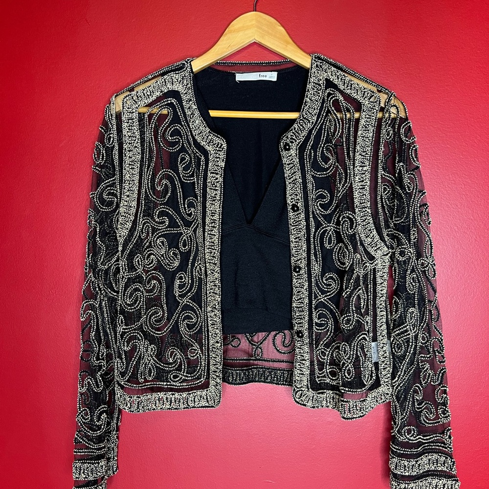 Vintage Black and Gold cropped button down mesh top.